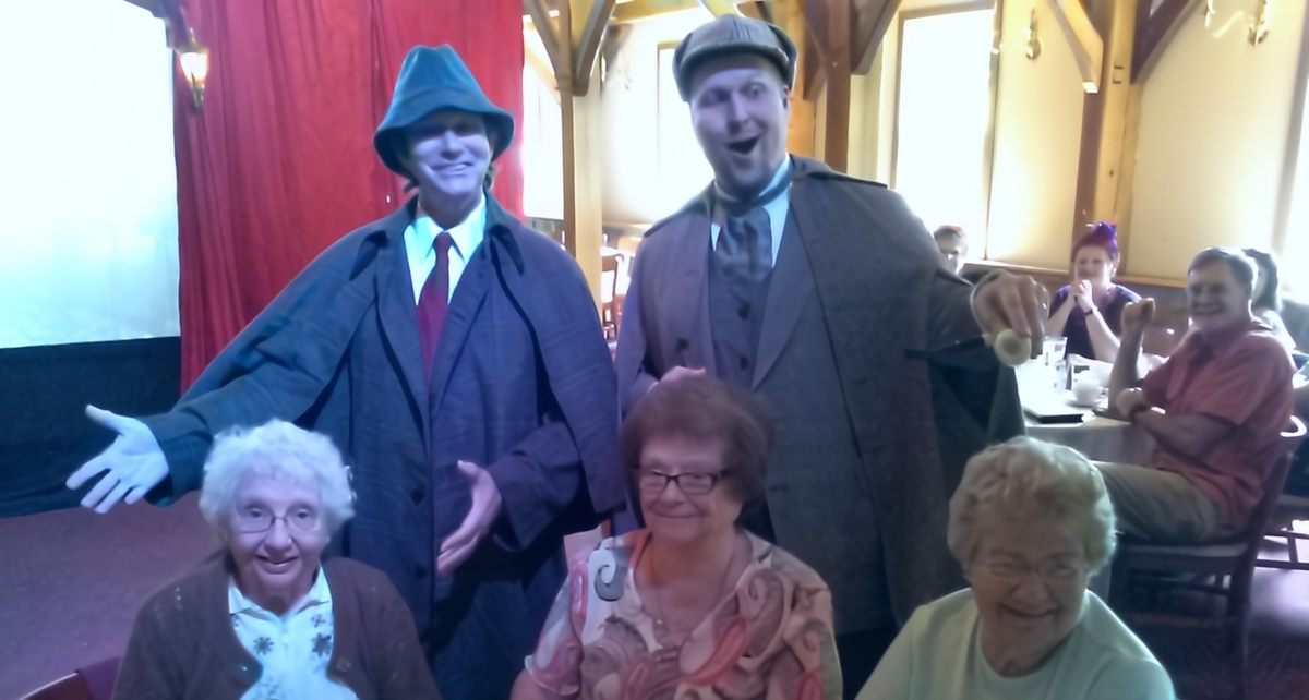 Ronald W Long actor engaging the audience in a thrilling murder mystery event filled with twists and turns