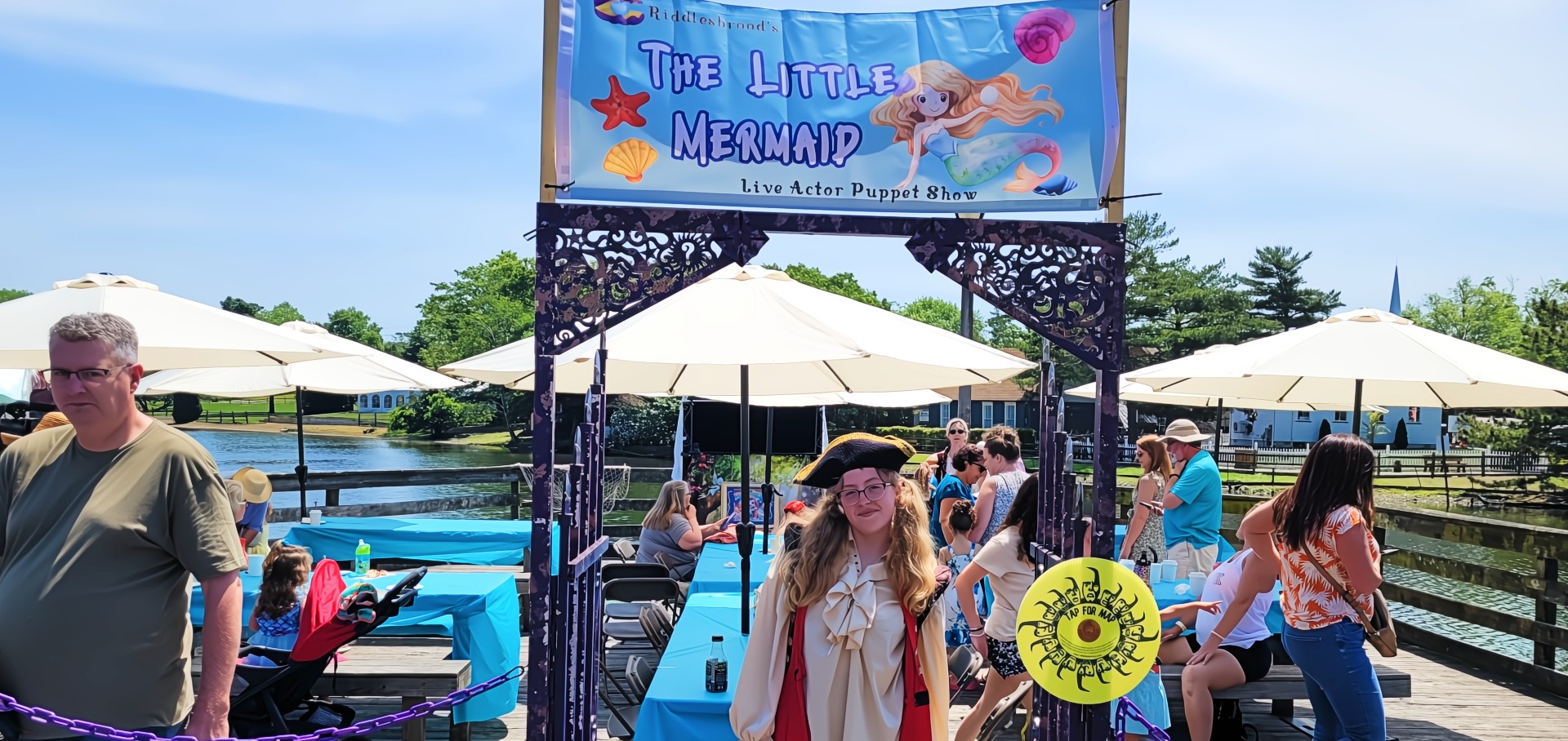 The enchanting entrance to Historic Smithville’s kids' puppet show, welcoming families to a world of fun and fantasy