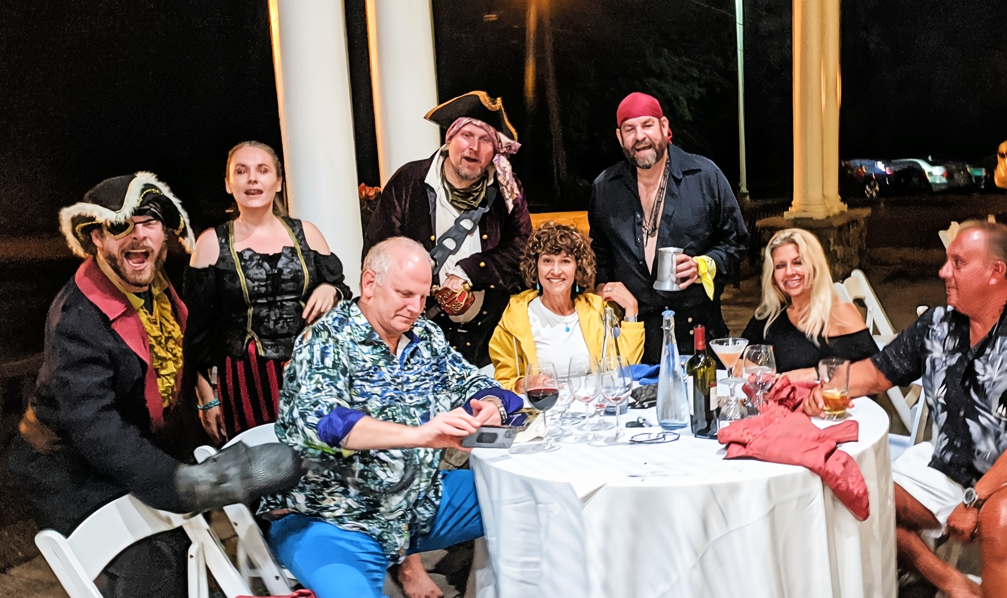 Guests and costumed pirates solving a thrilling murder mystery at the Jersey Shore