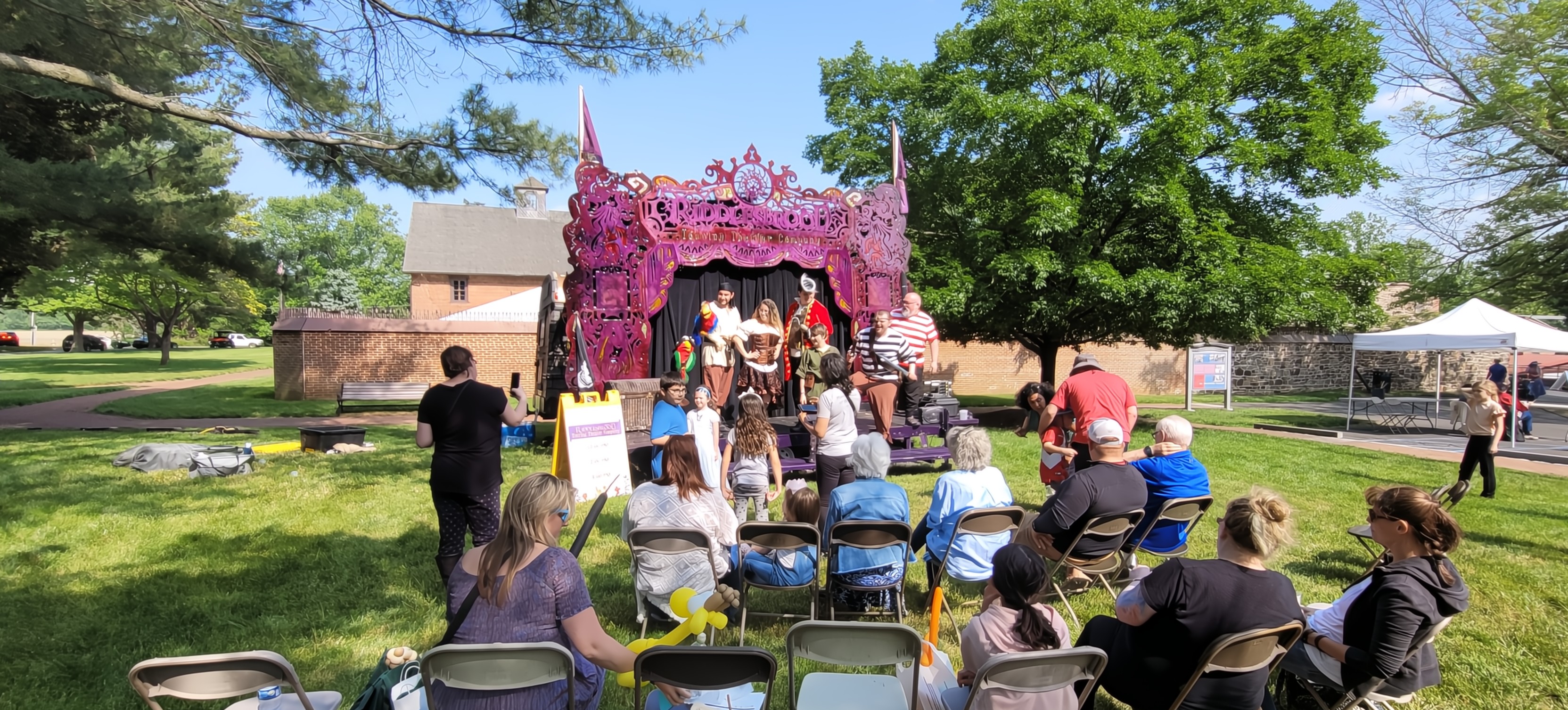An engaging and interactive performance by Riddlesbrood's Outdoor Touring Theater Company at an RV park.