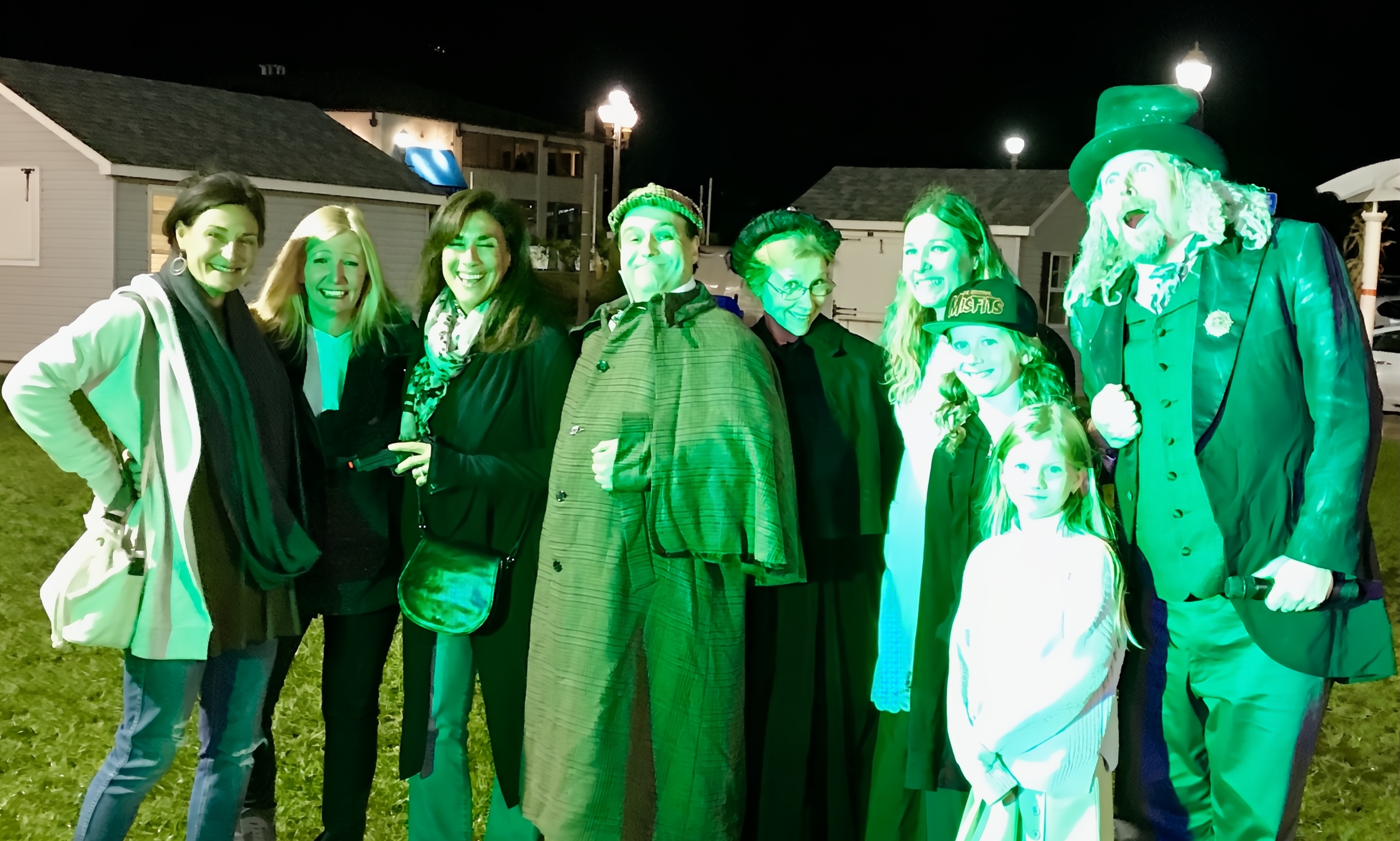 A professional murder mystery company performing an exciting show for guests in a scenic rural location