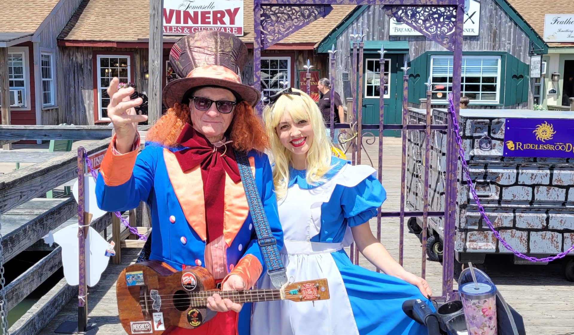 Actors engaging the crowd with a high-energy performance at an outdoor South Jersey festival