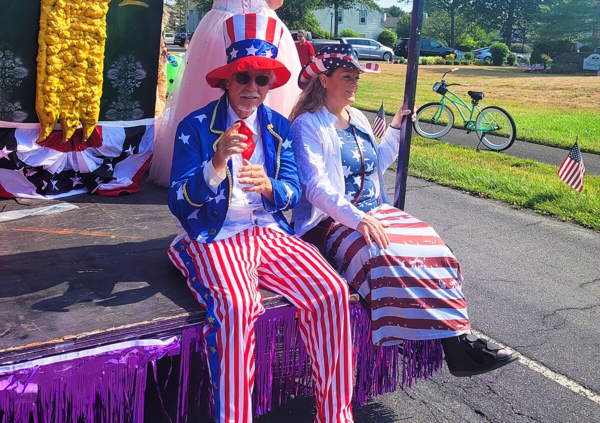Patriotic-themed actors engaging with spectators