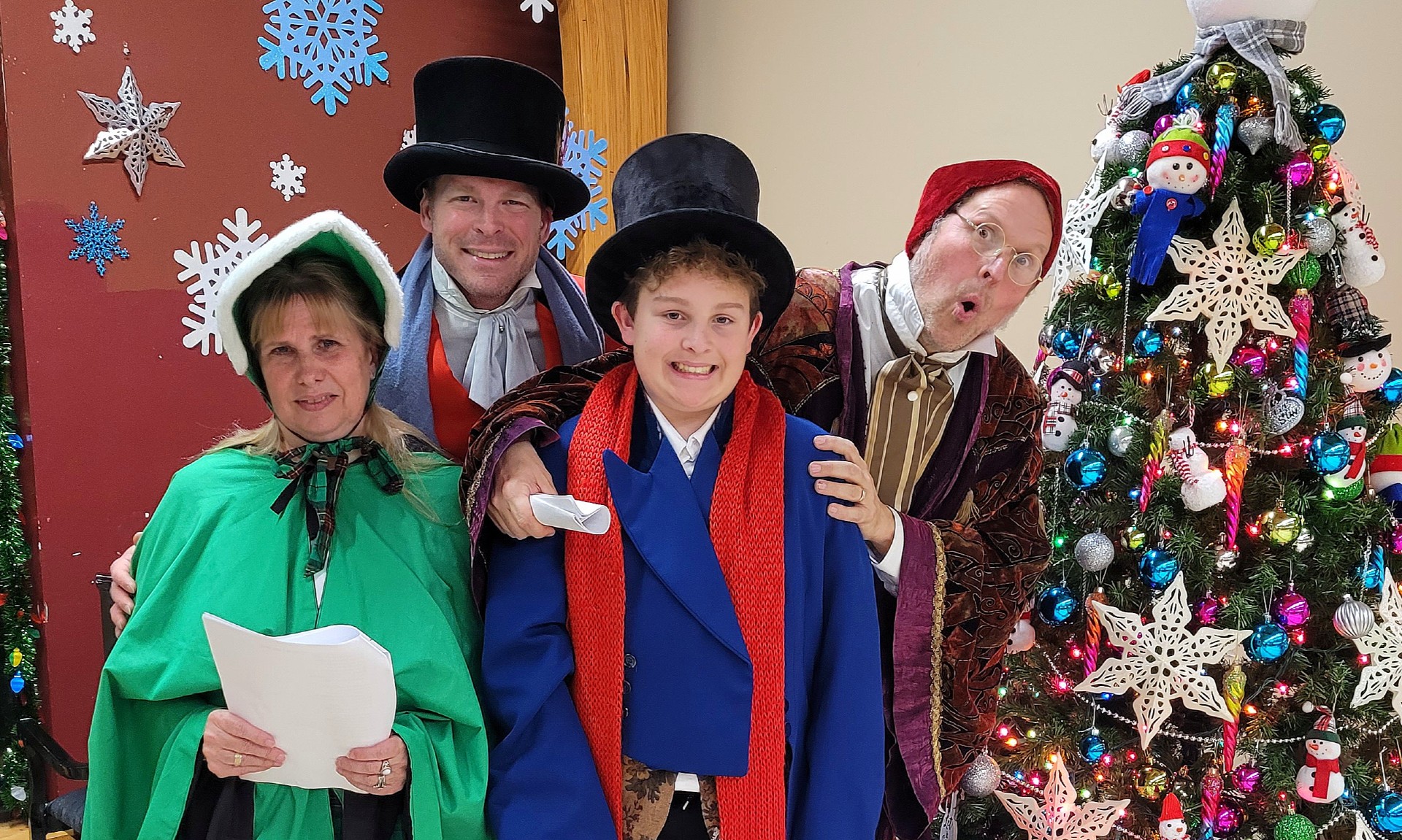 A Victorian-dressed detective character in a Christmas Murder Mystery theater performance.