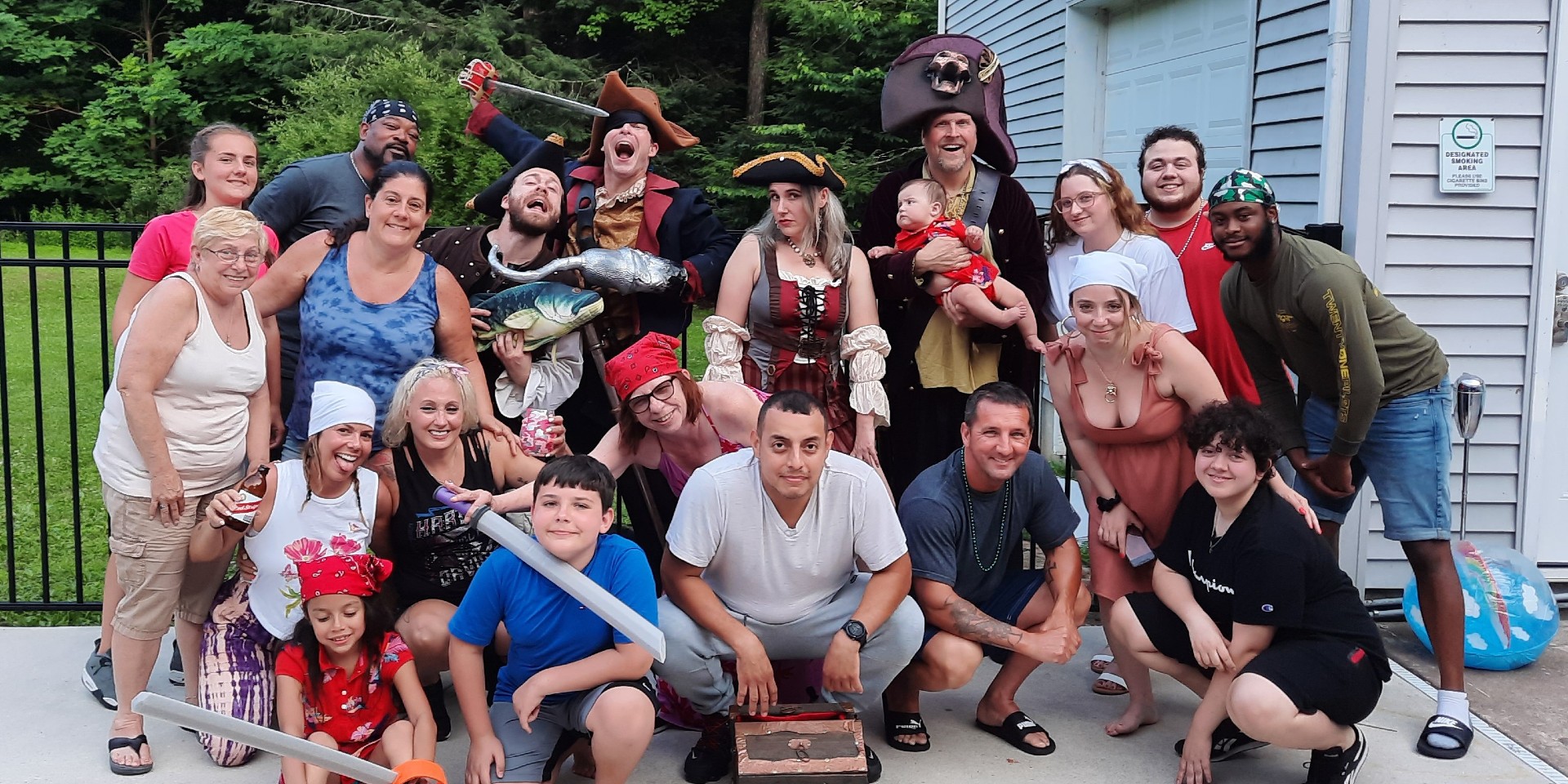 Actors in pirate costumes entertaining guests during a lively murder mystery at the Jersey Shore