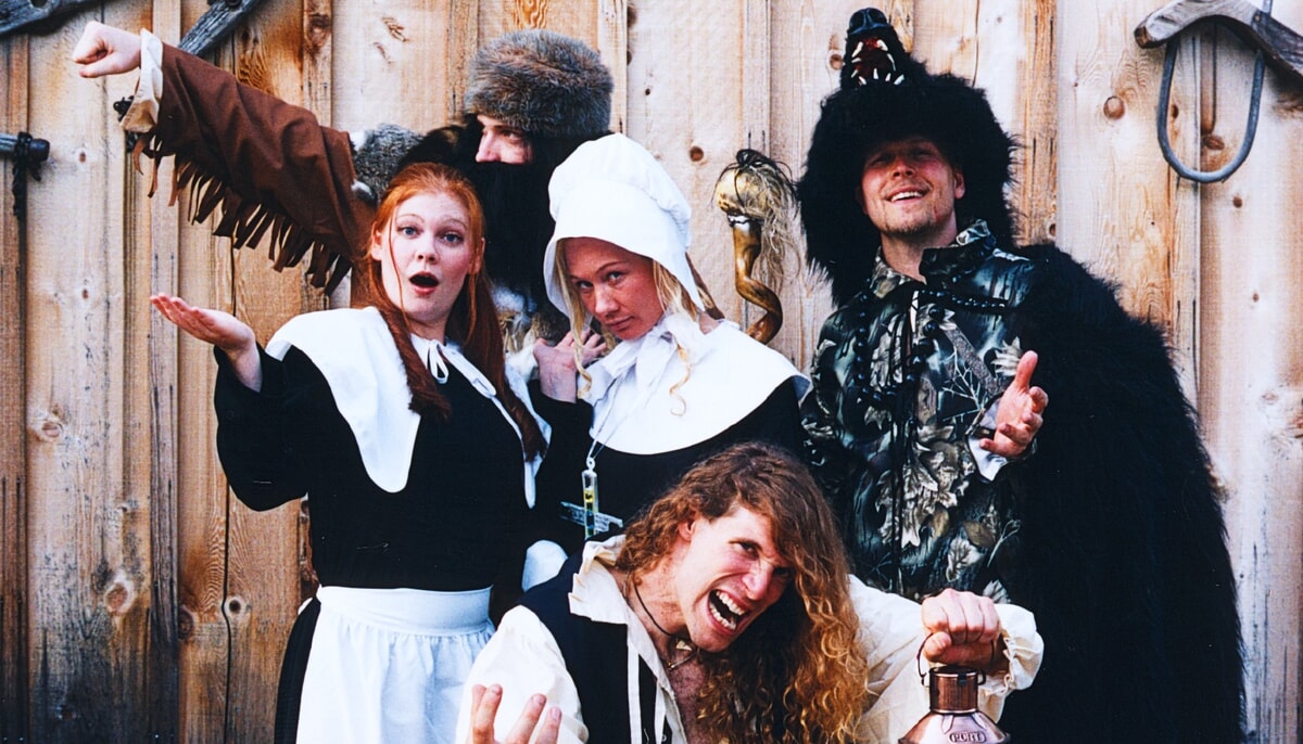 A group of attendees captivated by the live performance at the Jersey Devil Dinner Theater in Smithville, NJ.