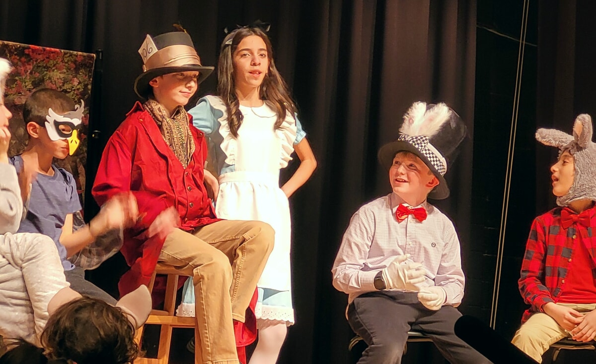 Kids doing Alice in Wonderland
