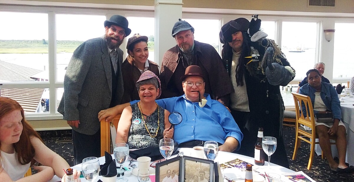 Audience members playing detectives in an interactive Sherlock Holmes mystery show—Engaging and fun!