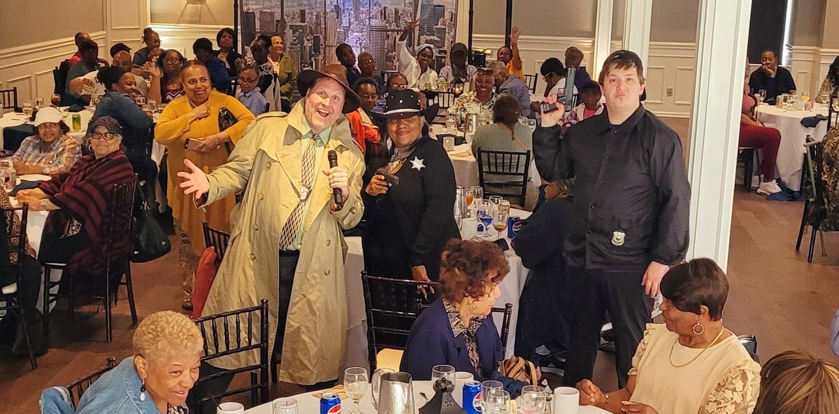 Guests interact with detectives in CSI: Cops and Detectives, engaging in the show while respecting murder mystery etiquette