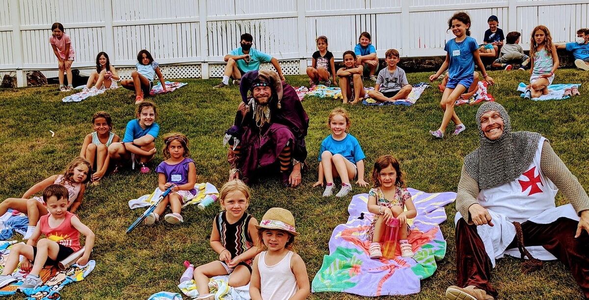 Children playing games and making friends at a summer camp in NJ