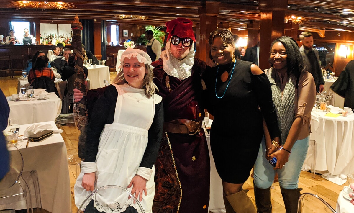 Guests participating in a Sherlock Holmes interactive mystery—An immersive and entertaining live experience!