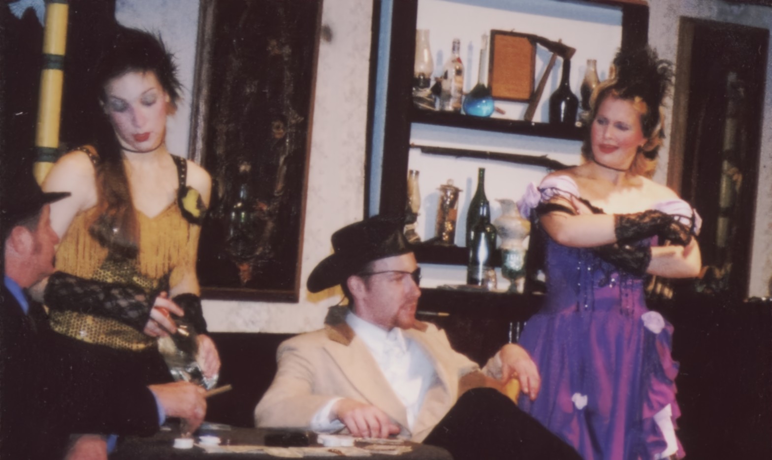 Actors in vintage costumes performing in past productions, highlighting theatrical history over the years