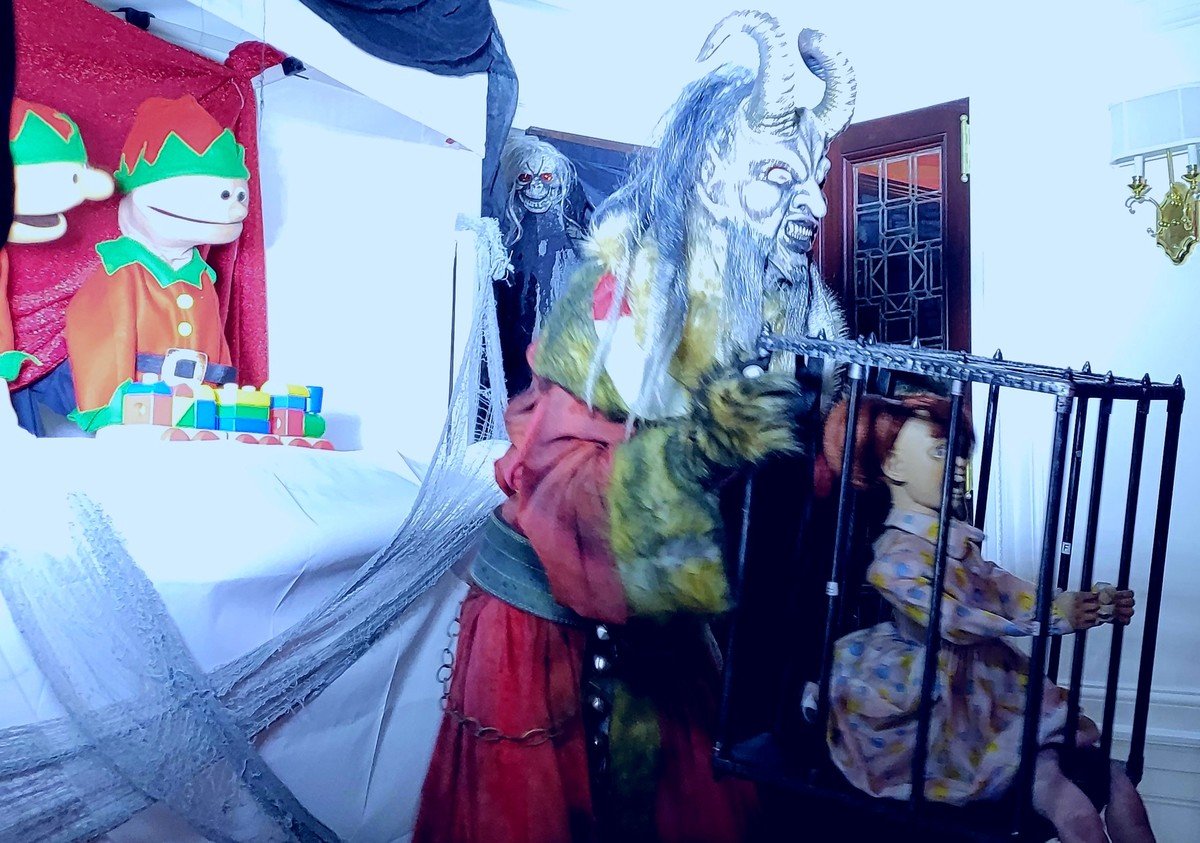 Spooky traveling haunt attraction with eerie props and costumed monsters