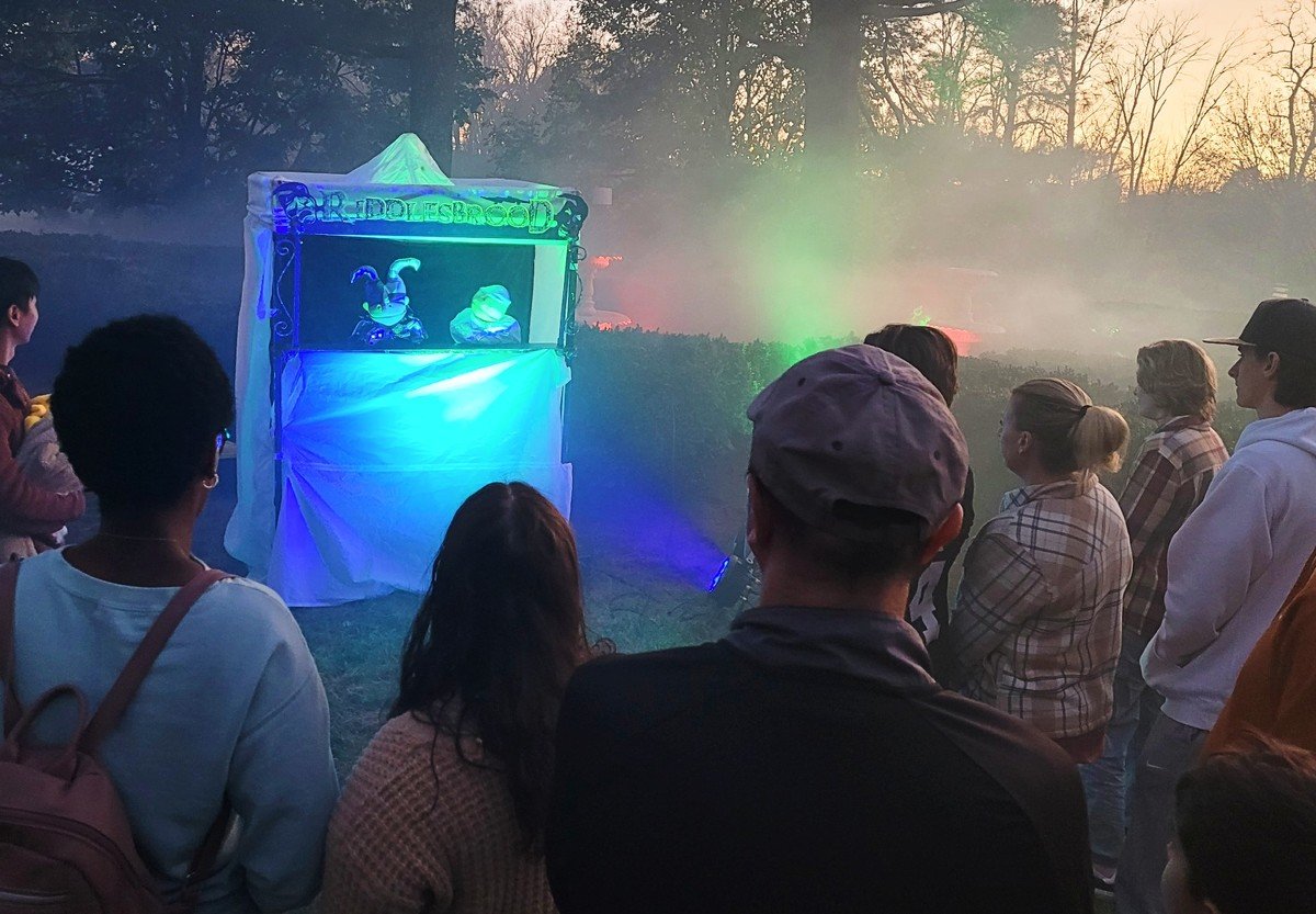 Scare actors performing at a pop-up Halloween haunt traveling from town to town